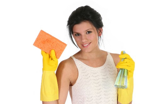 Local cleaner working in a shared house or apartment building in Elephant and Castle